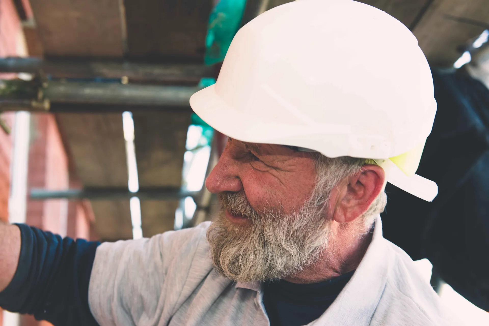 Craftsman working on brick restoration